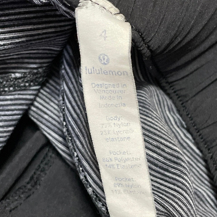 Lululemon Jet Women's Heather Black Mid Rise Slim Tapered Trousers Pants Size 4