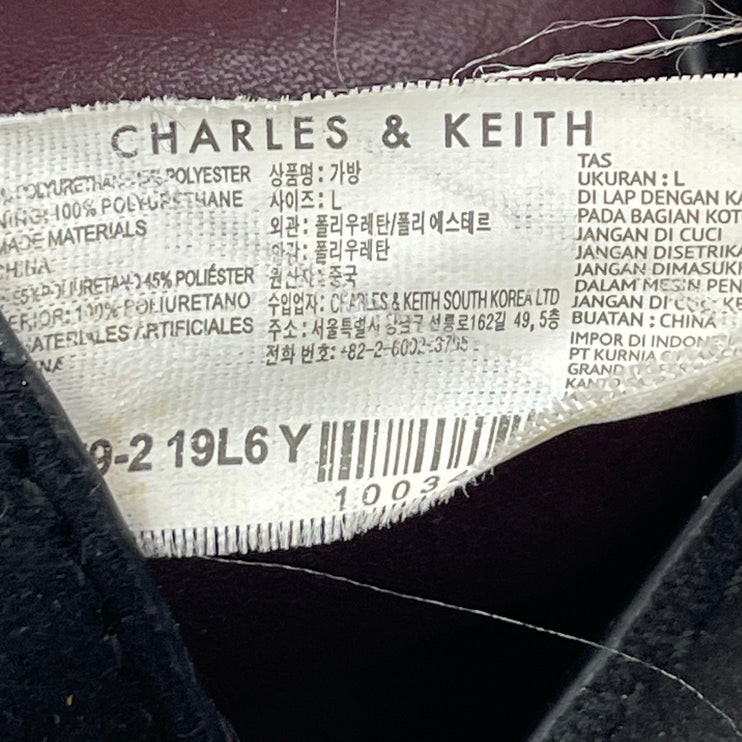 Charles & Keith Black 2-Way Tassel Faux Leather Shoulder Front Flap Backpack OS