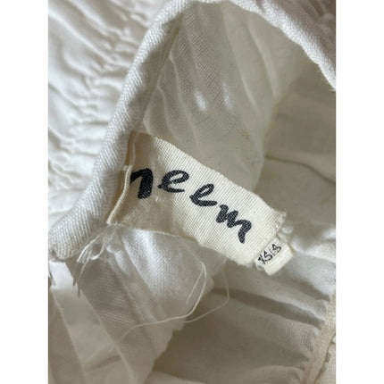 Neem Women's White Long Sleeve Smocked Mock Neck Peplum Blouse Top Size XS/S